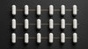 Fladrafinil evidence and safety guide: white capsules on dark background by Nootropix